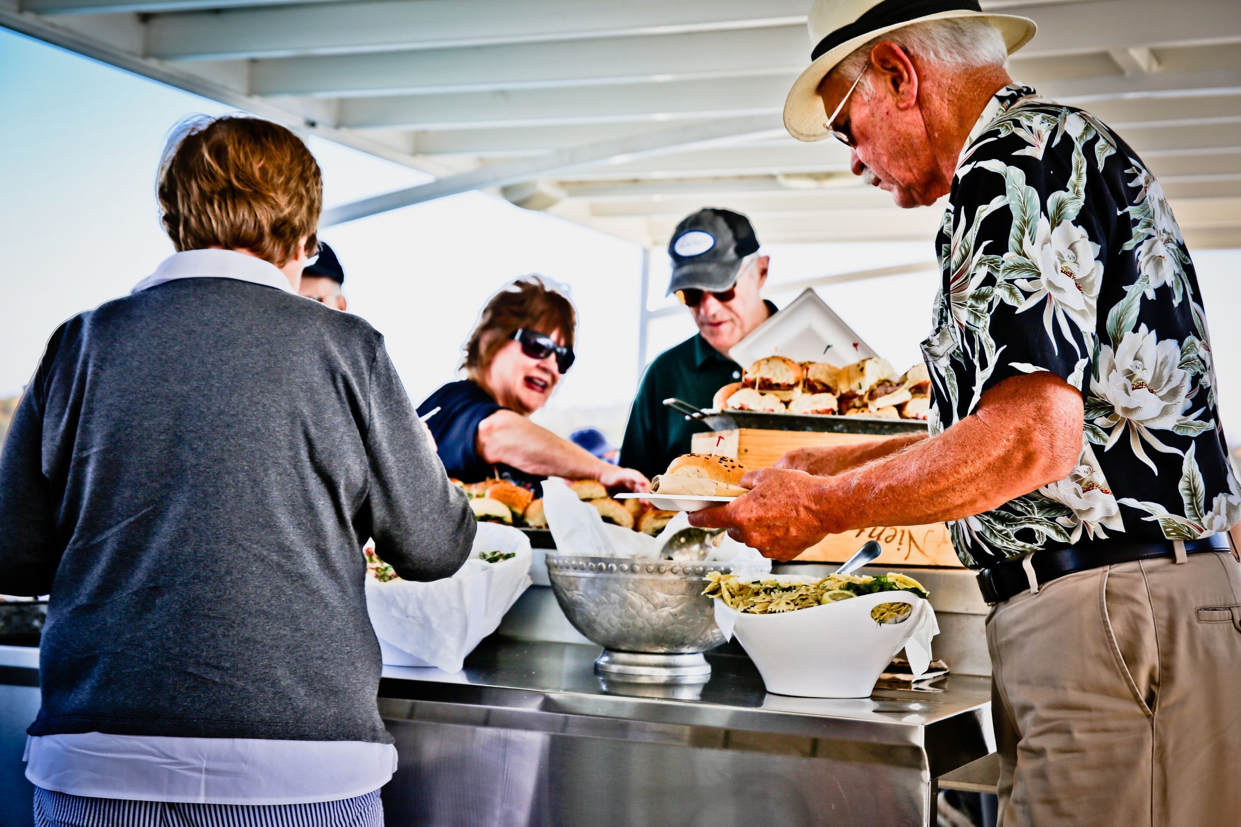 a group of people preparing food inside of it