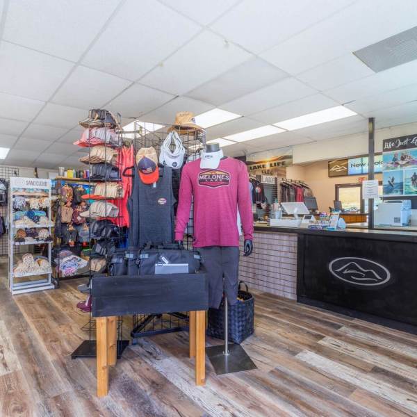 a group of people performing on a counter in a store
