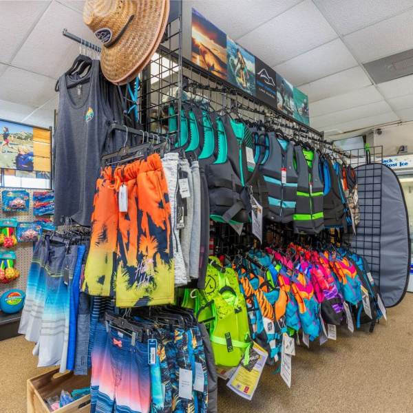 a group of people standing in front of a store